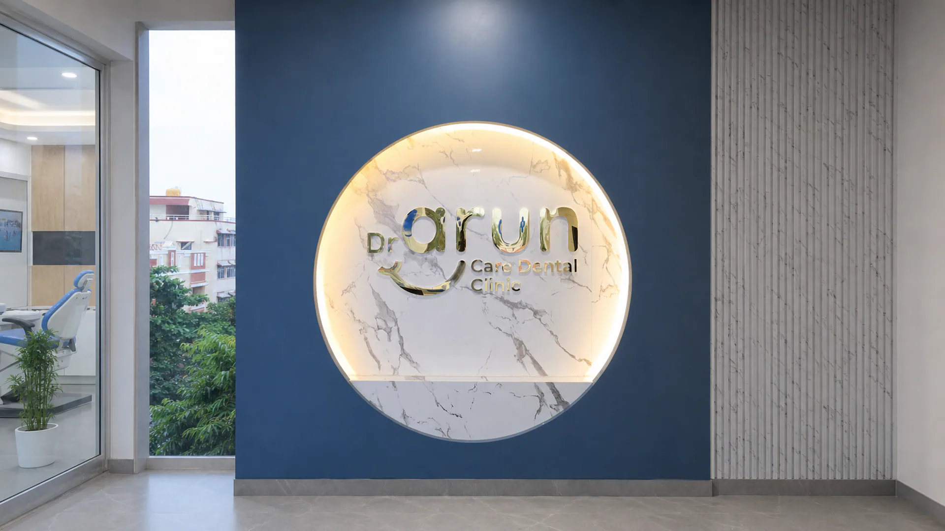 Illuminated circular Dr Arun clinic sign set into a deep blue reception wall.