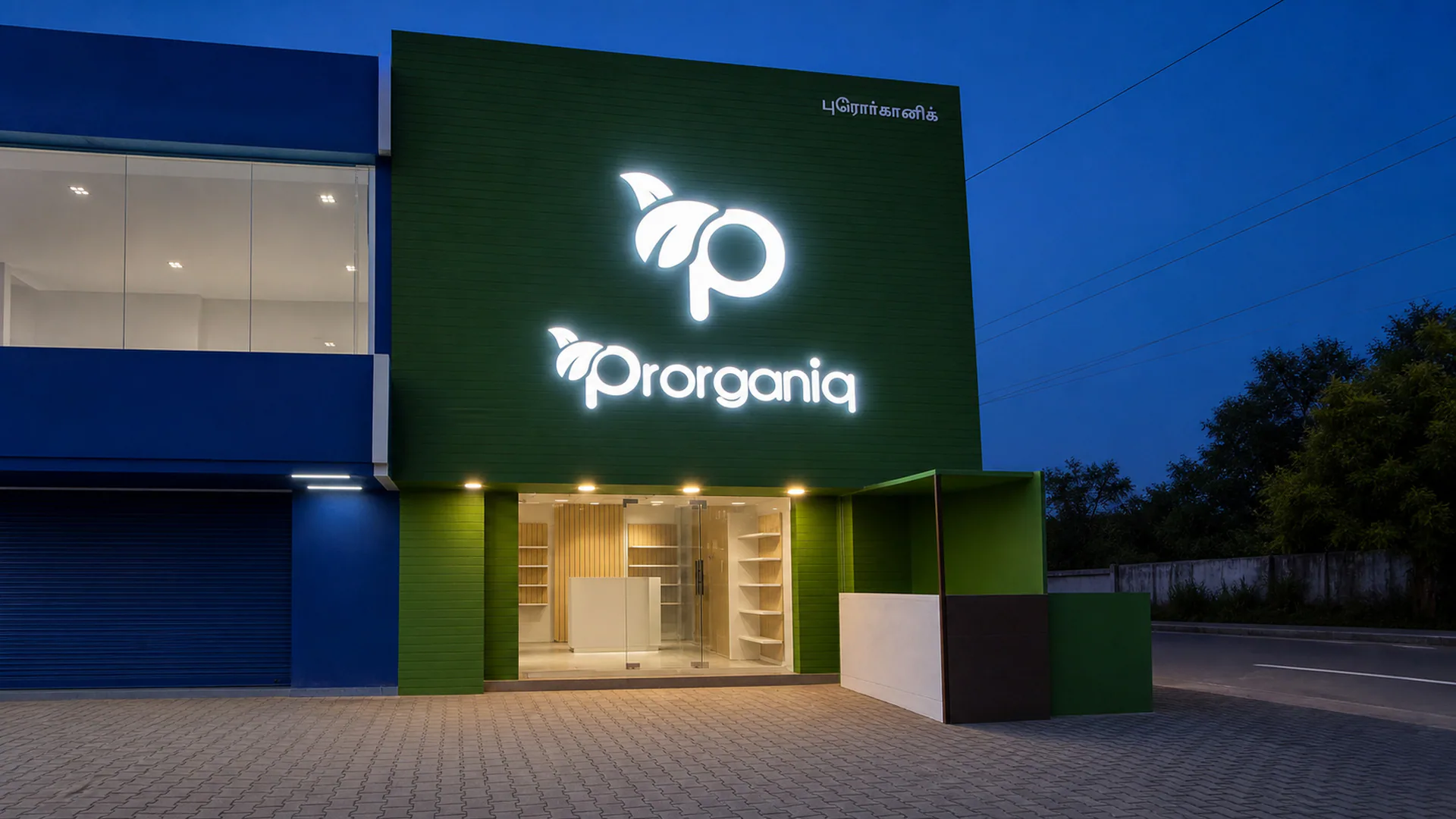 Dusk view of the illuminated green Prorganiq storefront and entrance.